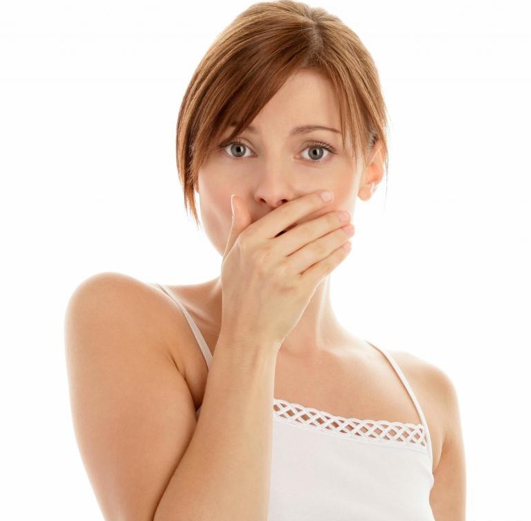 woman-covering-mouth